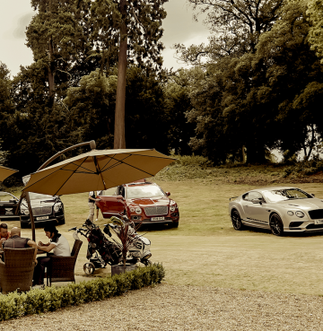 Cars on gravel net to seating area Cars on gravel net to seating area